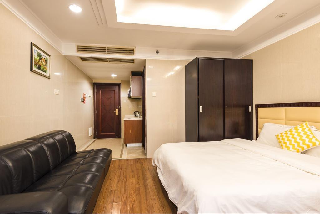 Grand Continental Apartment Guangzhou Buitenkant foto