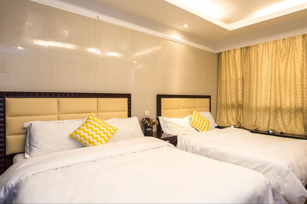 Grand Continental Apartment Guangzhou Buitenkant foto