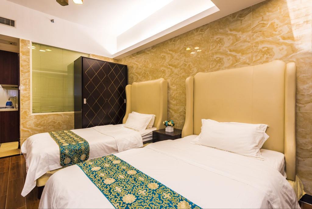 Grand Continental Apartment Guangzhou Buitenkant foto