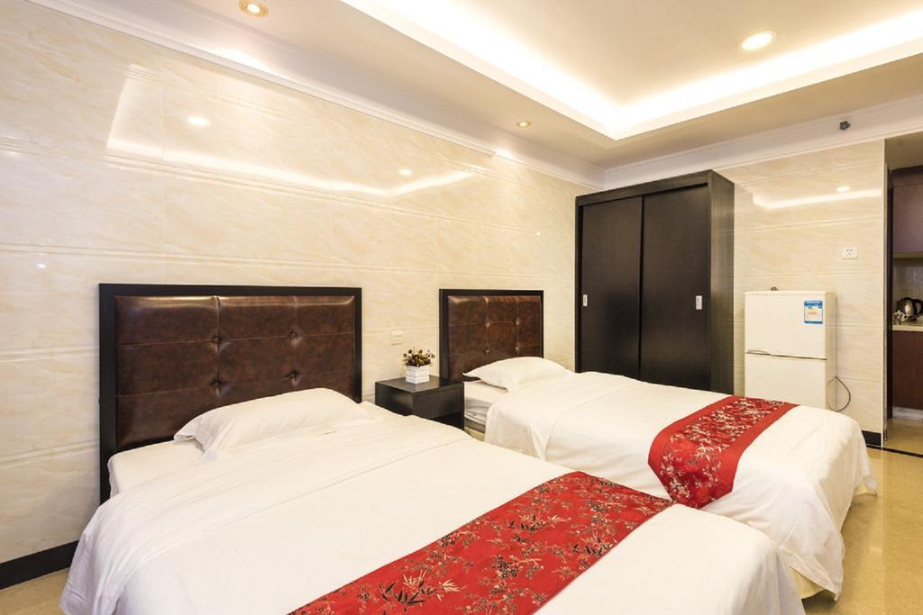 Grand Continental Apartment Guangzhou Buitenkant foto