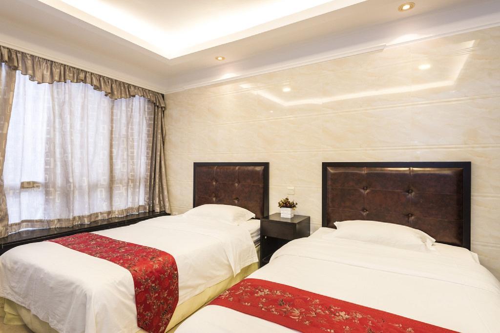 Grand Continental Apartment Guangzhou Buitenkant foto