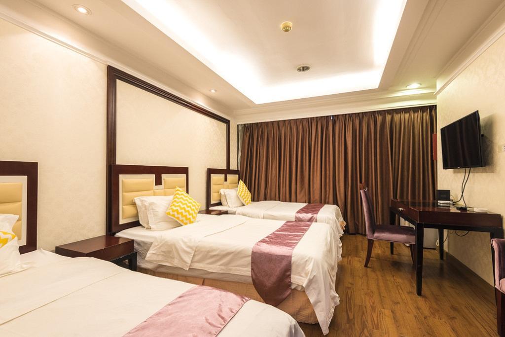 Grand Continental Apartment Guangzhou Buitenkant foto