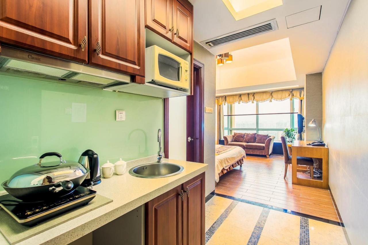 Grand Continental Apartment Guangzhou Buitenkant foto