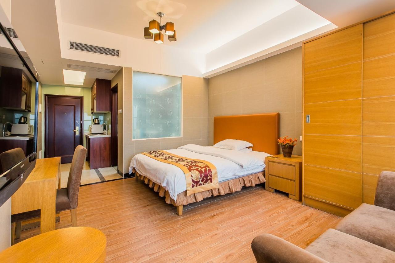 Grand Continental Apartment Guangzhou Buitenkant foto
