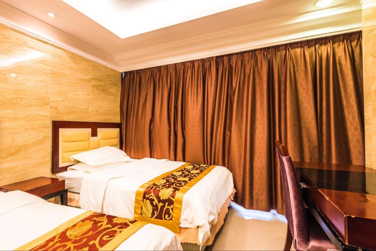 Grand Continental Apartment Guangzhou Buitenkant foto